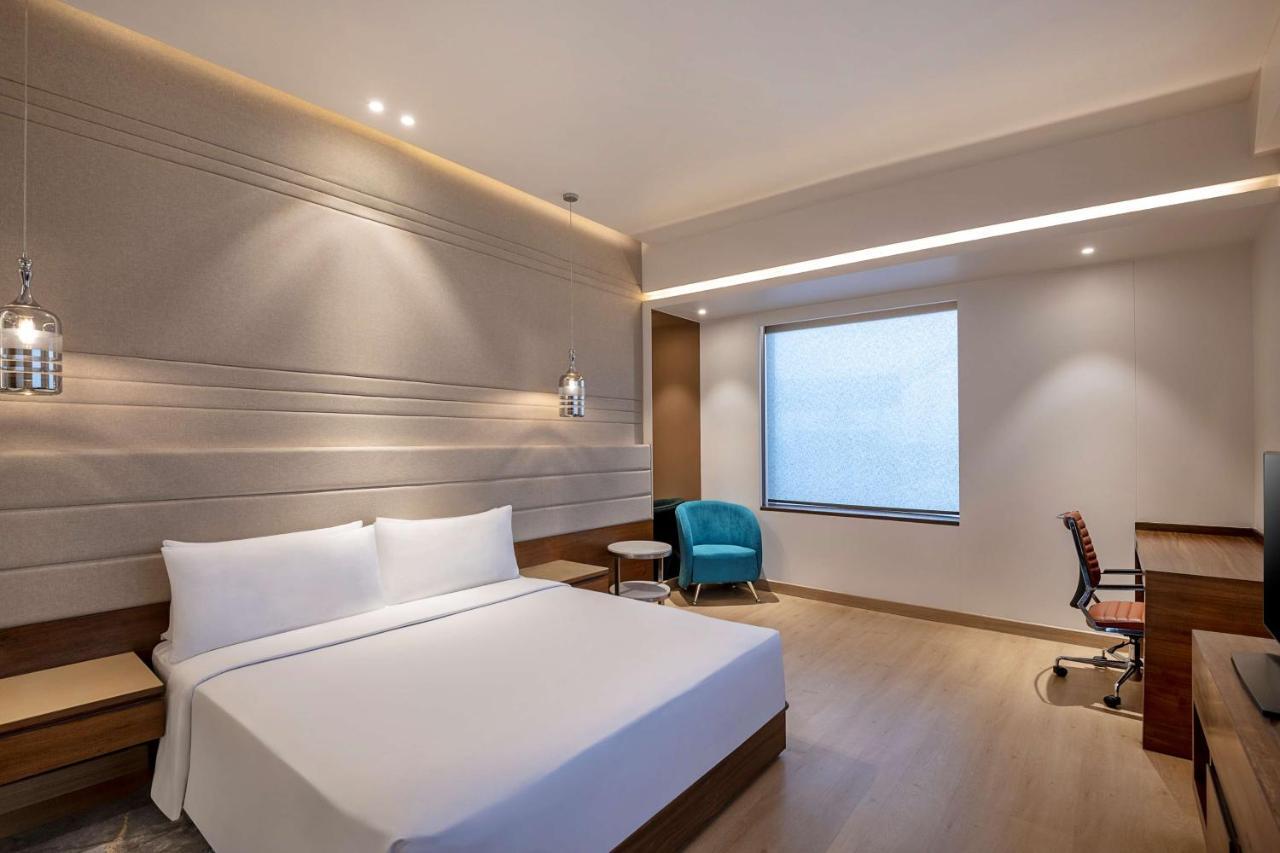 فندق Radisson Blu Towers Kaushambi Delhi Ncr غازي أباد المظهر الخارجي الصورة A room at the hotel